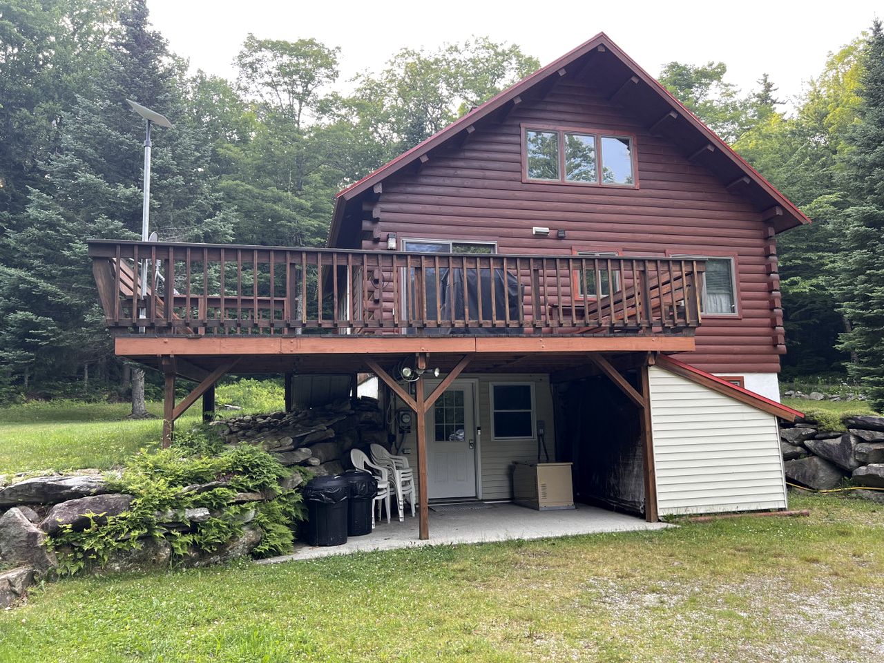 Fantastic Lakefront Wooden Cabin Settled Between Trees in Stratton, Vermont