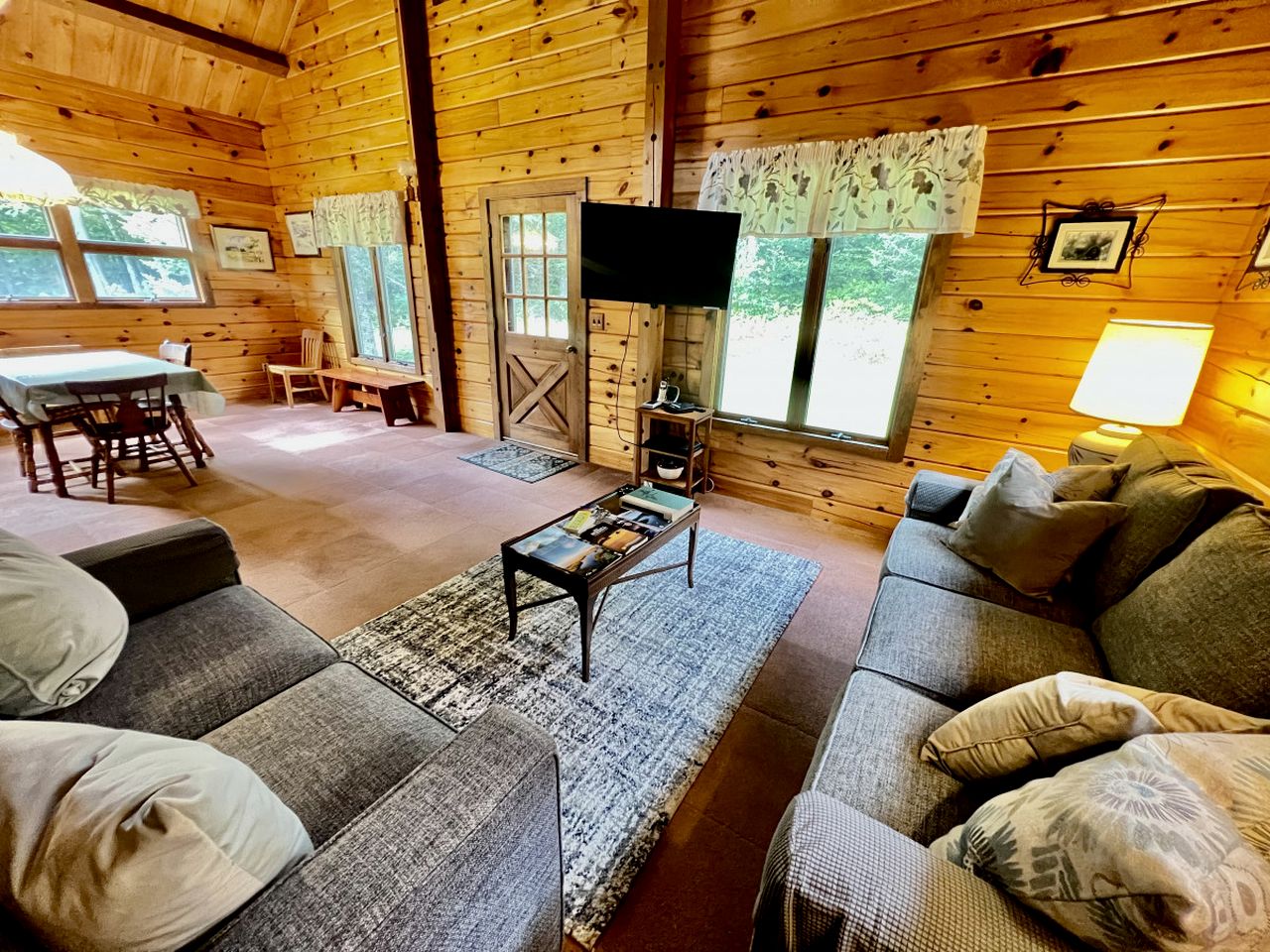 Fantastic Lakefront Wooden Cabin Settled Between Trees in Stratton, Vermont