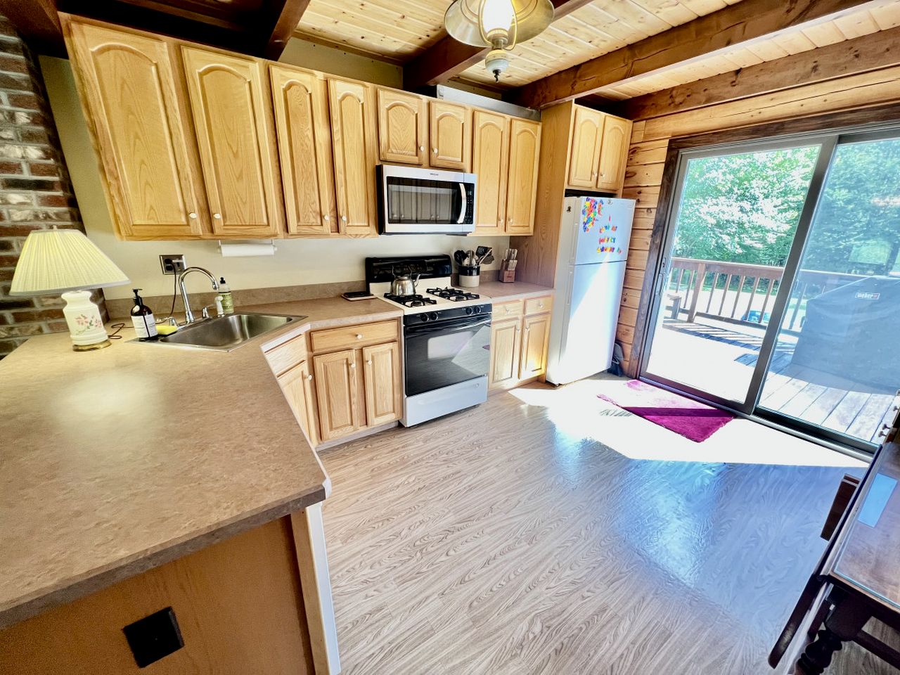 Fantastic Lakefront Wooden Cabin Settled Between Trees in Stratton, Vermont