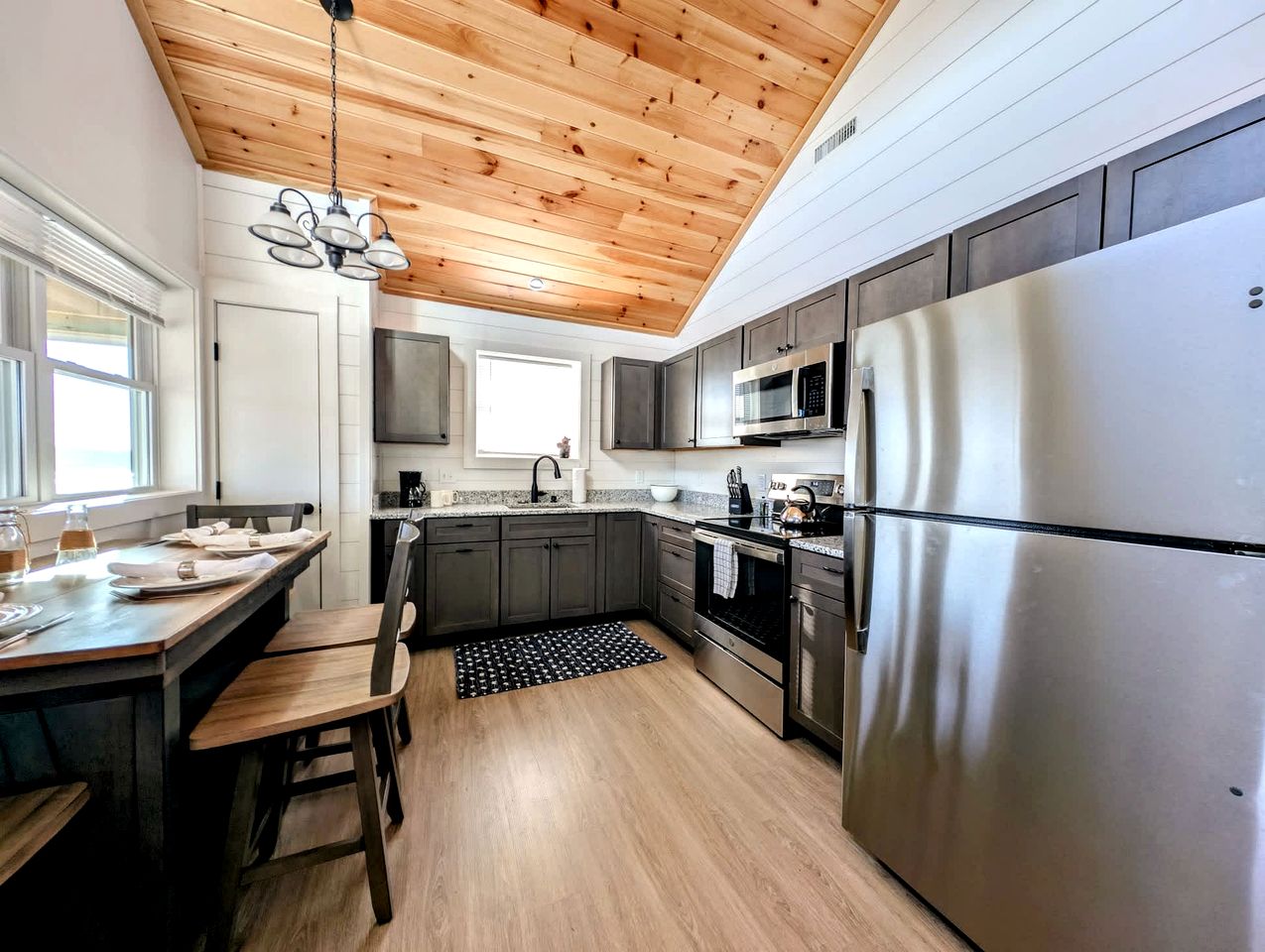 Pet-Friendly Lakeside Cabin with Fire Pit & Screened Porch near Flanders Pond in Sullivan, Maine