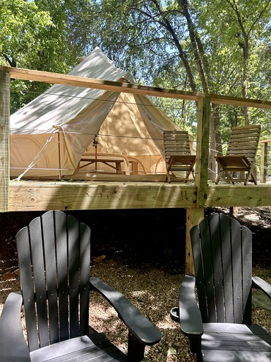 Peaceful Glamping Tents with Elevated Decks, Cozy Fire Pit, and Secluded Forest Views Near Gentry, AR