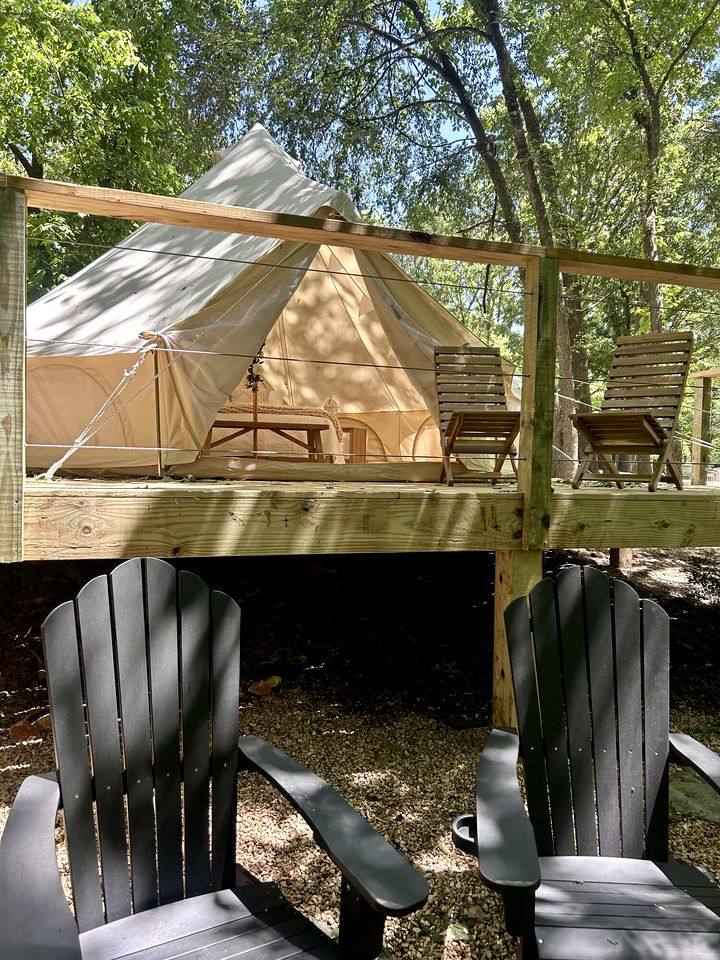 Peaceful Glamping Tents with Elevated Decks, Cozy Fire Pit, and Secluded Forest Views Near Gentry, AR
