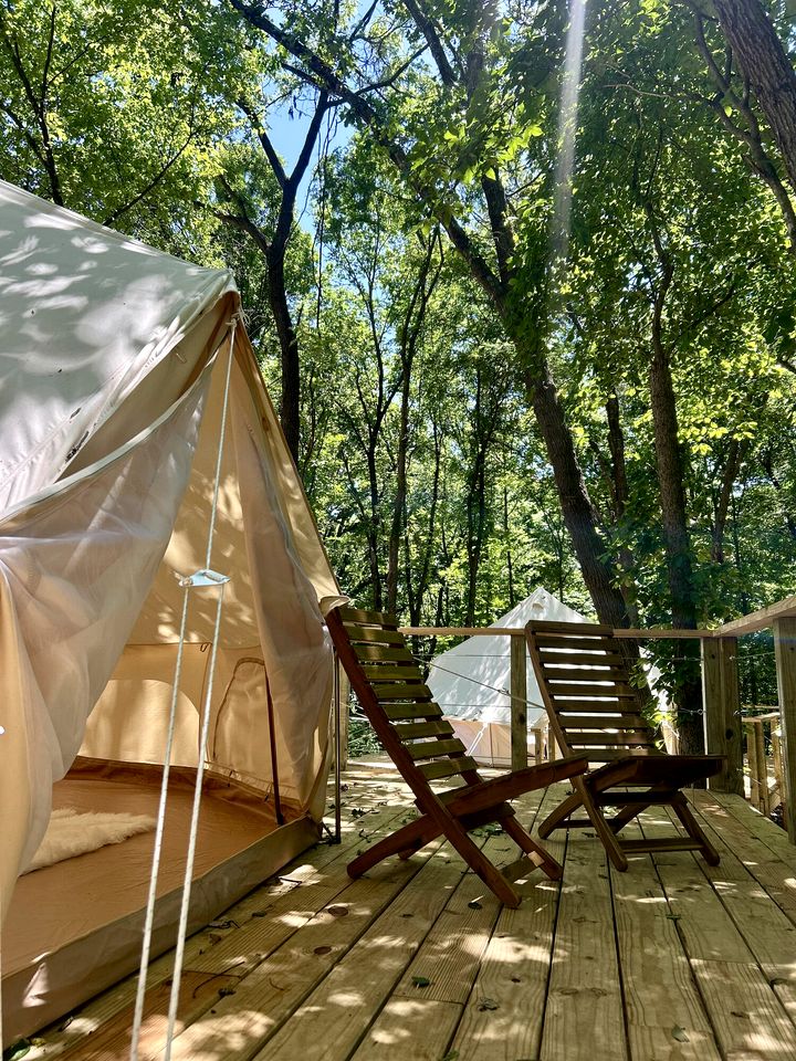 Peaceful Glamping Tents with Elevated Decks, Cozy Fire Pit, and Secluded Forest Views Near Gentry, AR