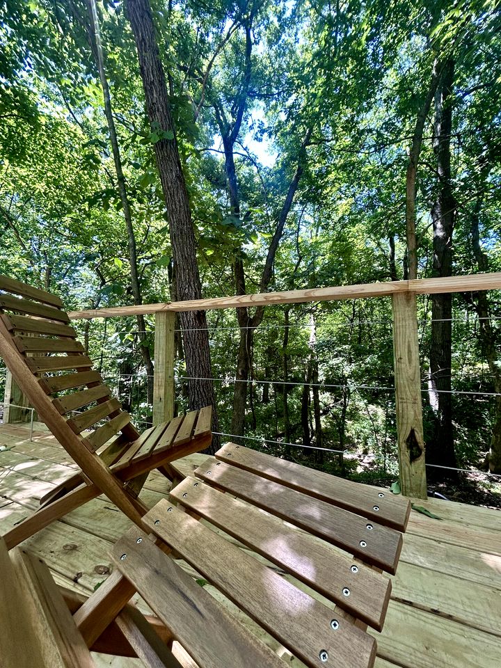 Peaceful Glamping Tents with Elevated Decks, Cozy Fire Pit, and Secluded Forest Views Near Gentry, AR