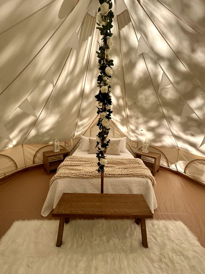 Peaceful Glamping Tents with Elevated Decks, Cozy Fire Pit, and Secluded Forest Views Near Gentry, AR
