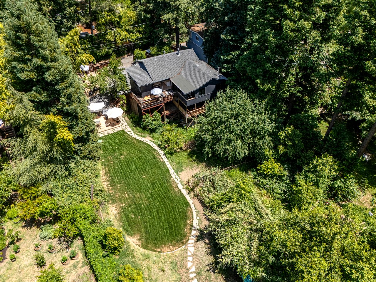 Stylish Riverfront Retreat with Private Dock & Hot Tub near Wineries in Forestville, California