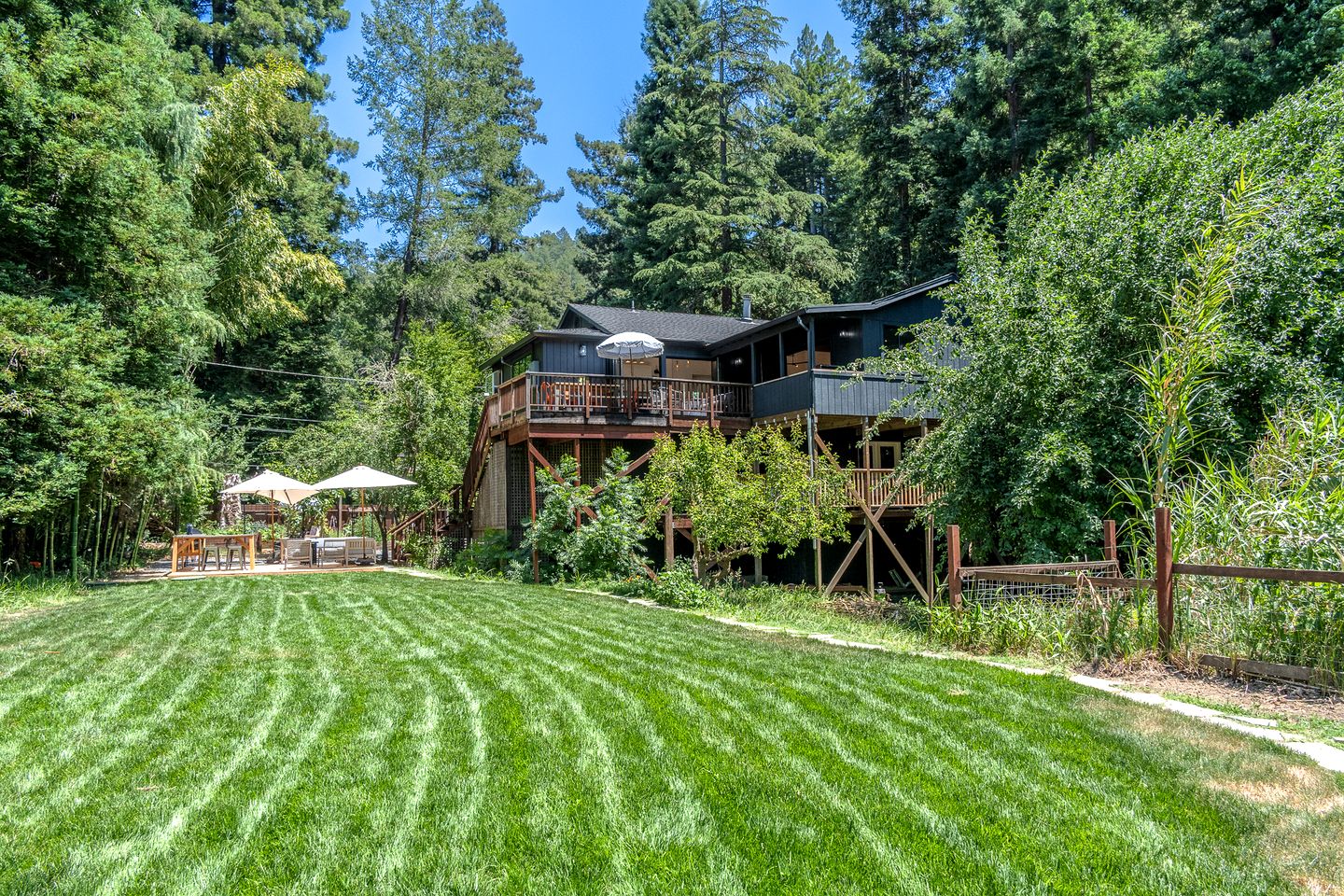 Stylish Riverfront Retreat with Private Dock & Hot Tub near Wineries in Forestville, California
