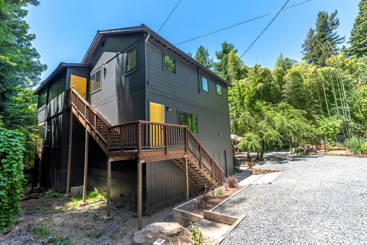 Stylish Riverfront Retreat with Private Dock & Hot Tub near Wineries in Forestville, California