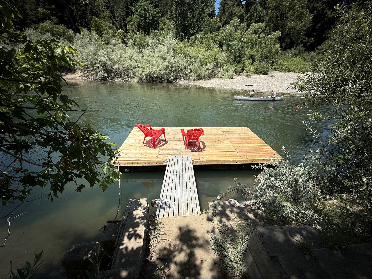 Stylish Riverfront Retreat with Private Dock & Hot Tub near Wineries in Forestville, California