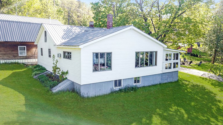 Embrace Nature in this Breathtaking Cottage in Portage Lake, Maine