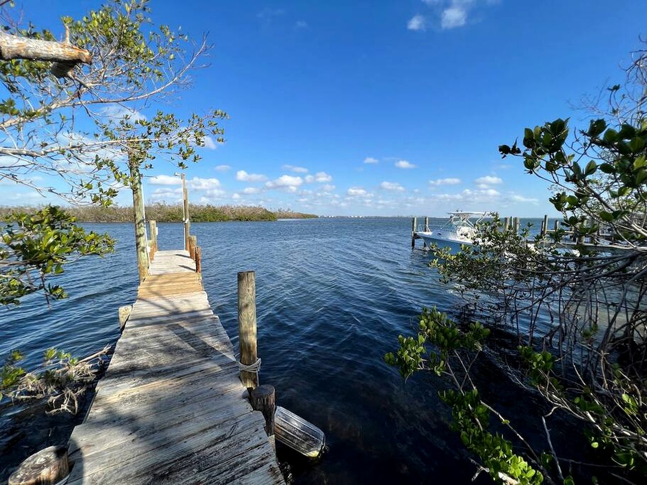 Charming Waterfront Cottage with Private Dock near Little Gasparilla Island, Florida