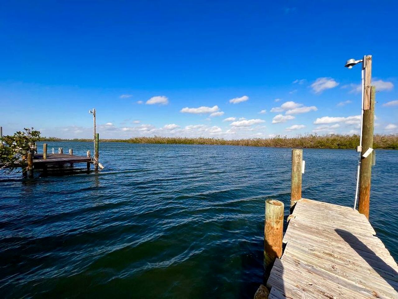 Charming Waterfront Cottage with Private Dock near Little Gasparilla Island, Florida
