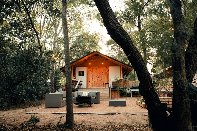 Cozy Lakefront Glamping Cabin with Private Patio near Austin, Texas