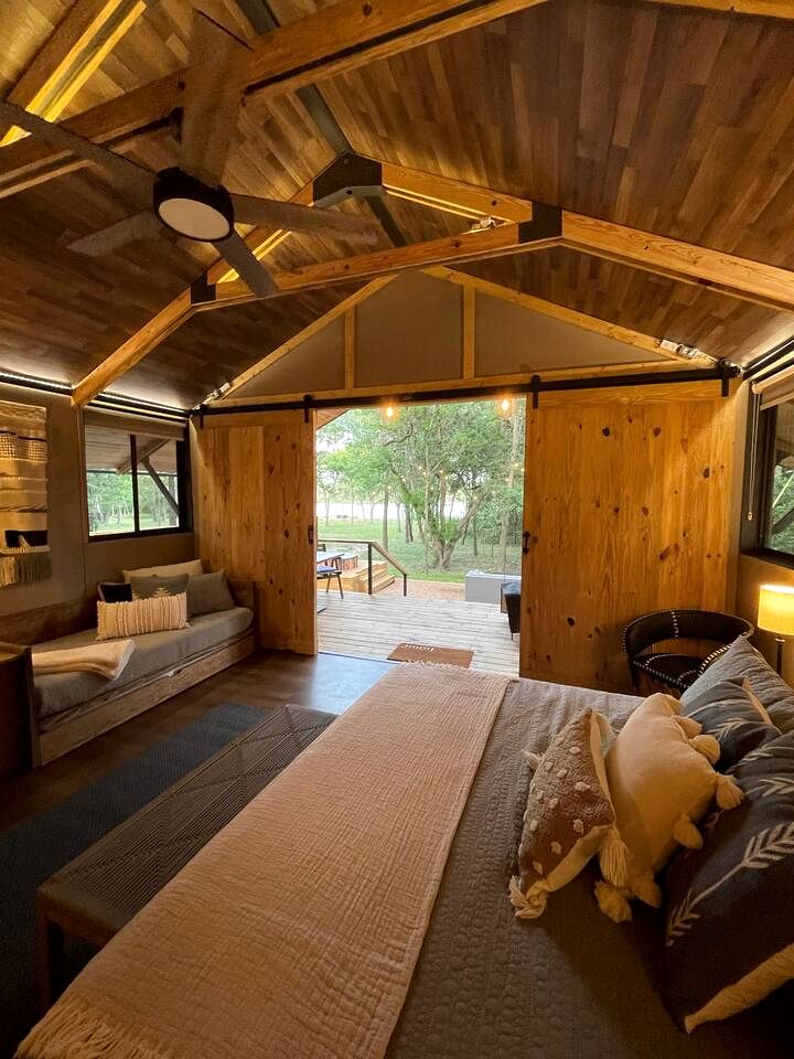 Cozy Lakefront Glamping Cabin with Private Patio near Austin, Texas