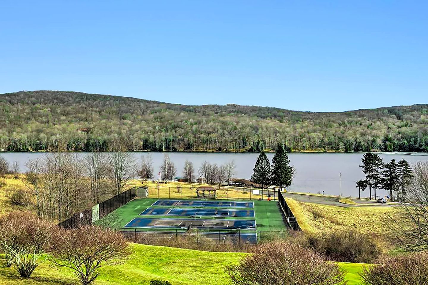 Private Lake/Beach Cabin with Fire Pit and Large Deck - Access to Golf and Community Amenities at this Terra Alta, WV Getaway