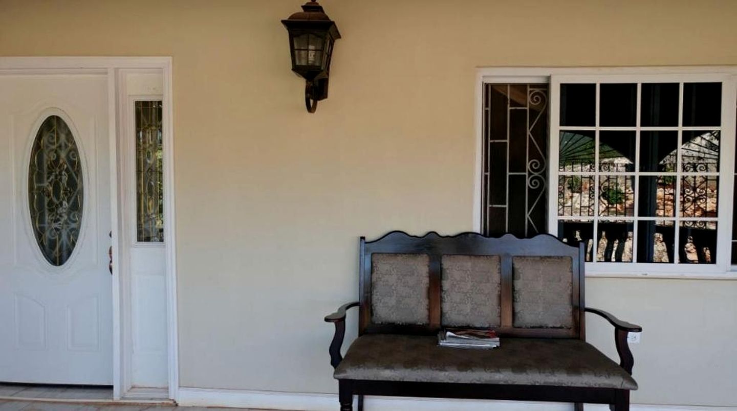 Scenic Poolside Sanctuary with Gazebo Hangout and Mountain Views in Manchester, Jamaica