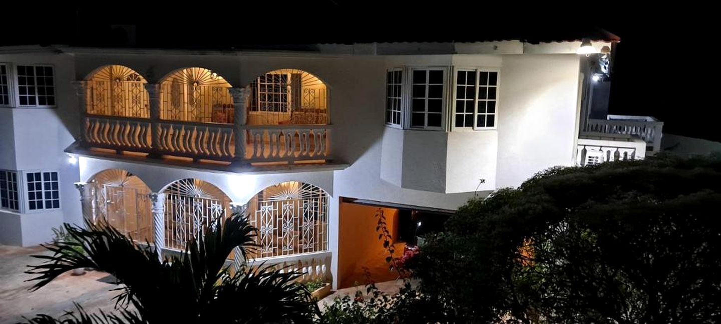Scenic Poolside Sanctuary with Gazebo Hangout and Mountain Views in Manchester, Jamaica
