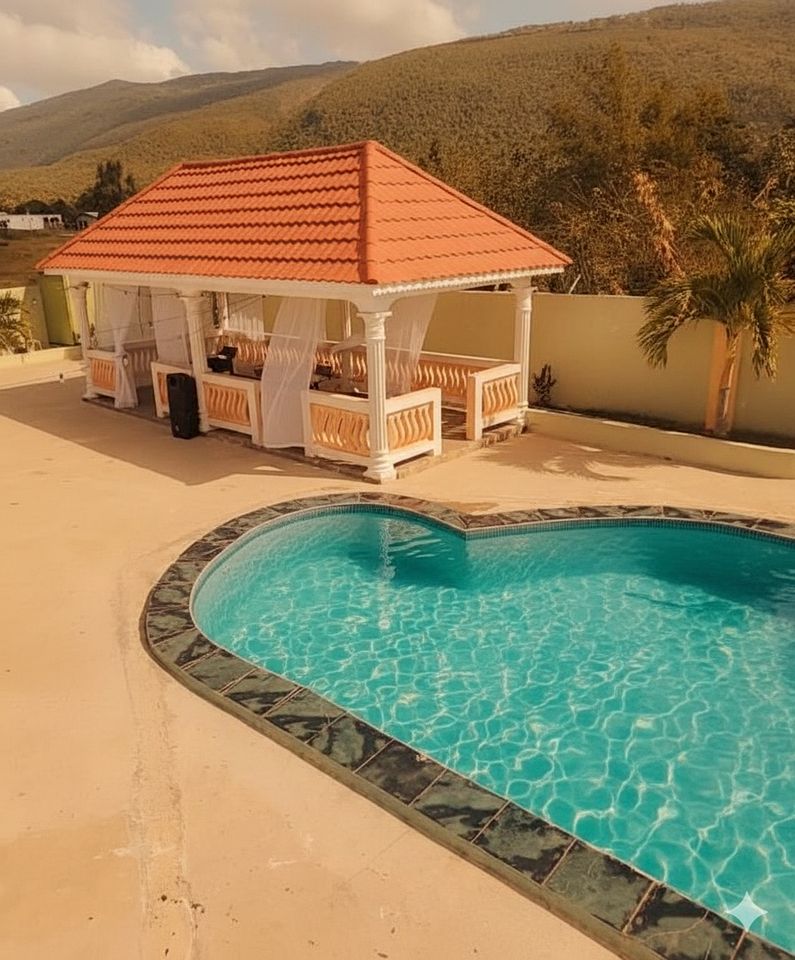 Scenic Poolside Sanctuary with Gazebo Hangout and Mountain Views in Manchester, Jamaica