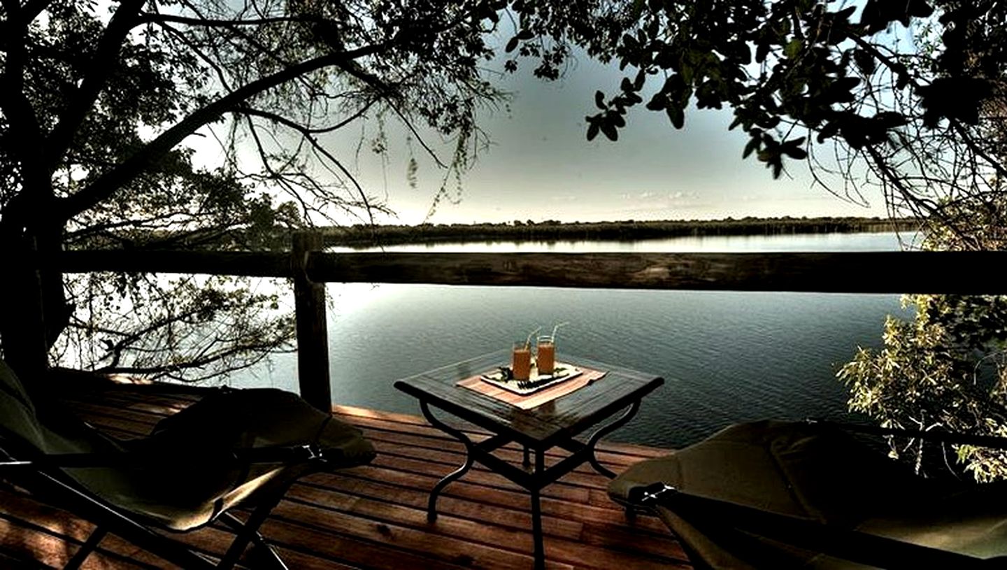 Raised Thatch and Reed Chalets on Xugana Lagoon of Botswana