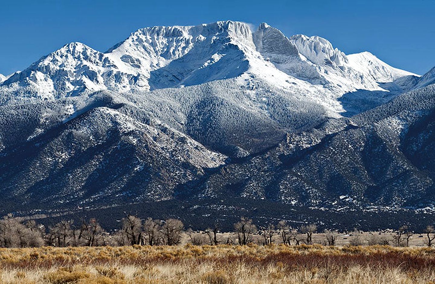 View of the Rocky Mountains in Colorado from a Crestone vacation rental.