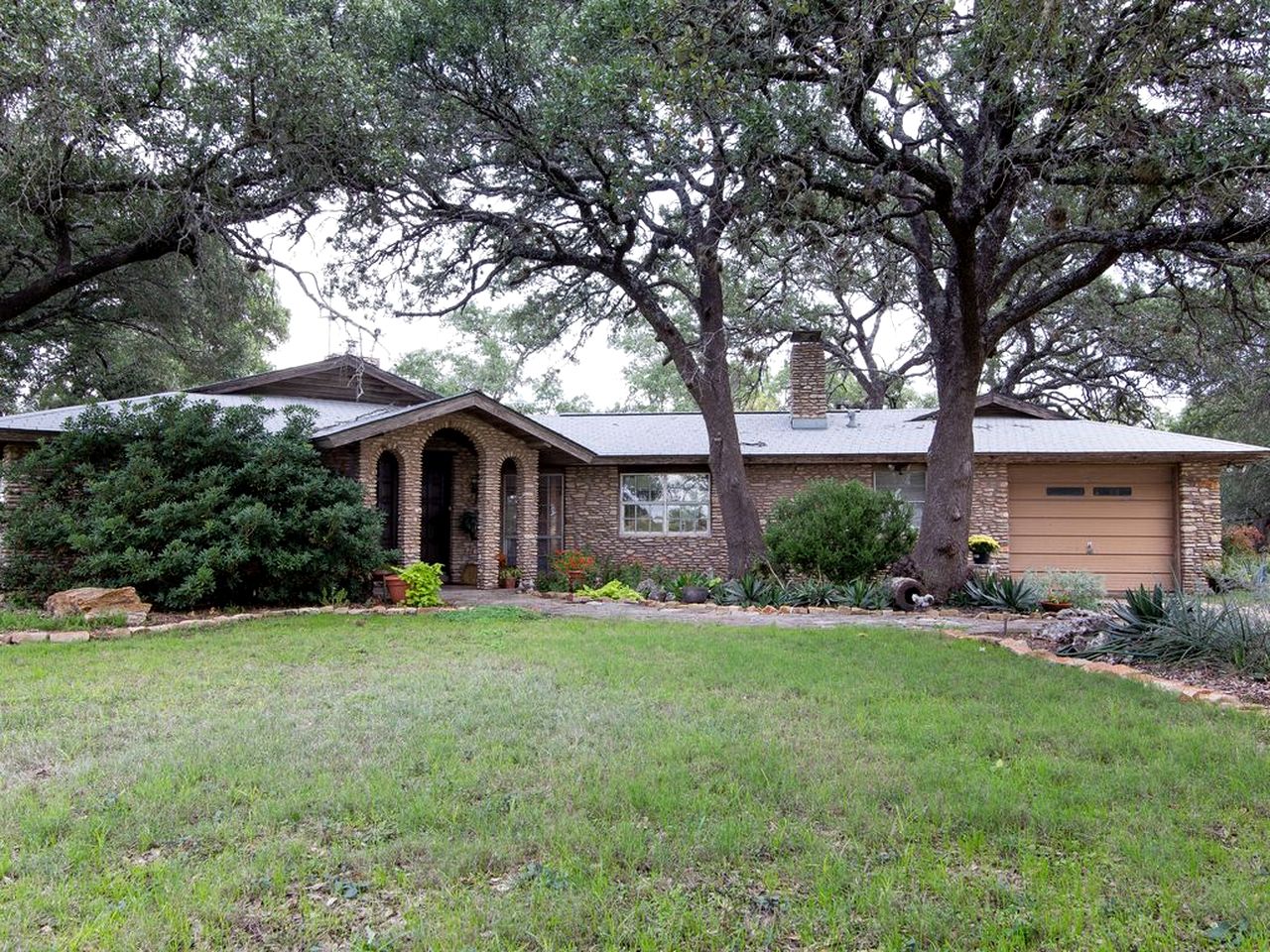 Lovely Cottage Rental with Waterfall on San Gabriel River near Austin, Texas
