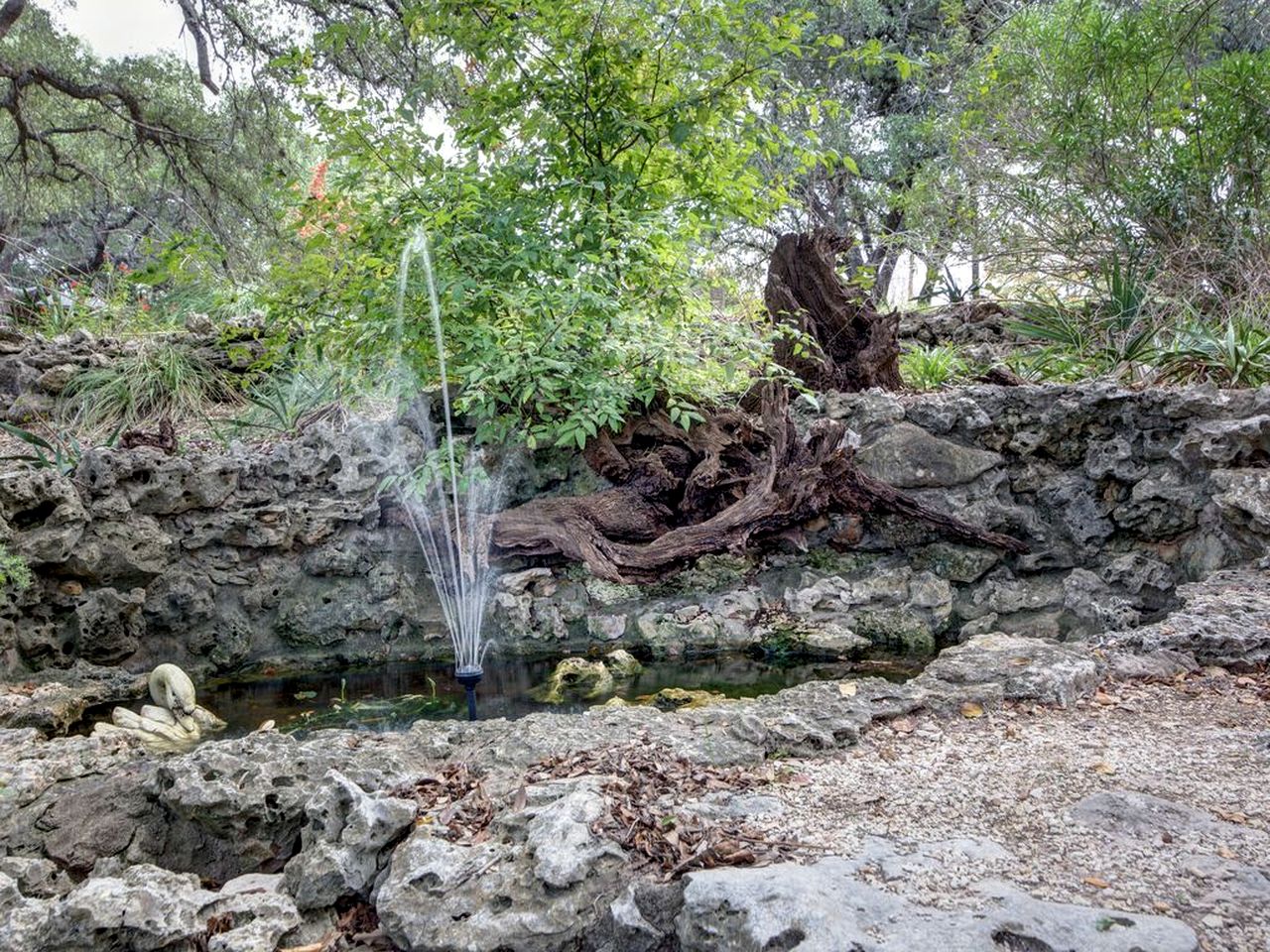 Lovely Cottage Rental with Waterfall on San Gabriel River near Austin, Texas