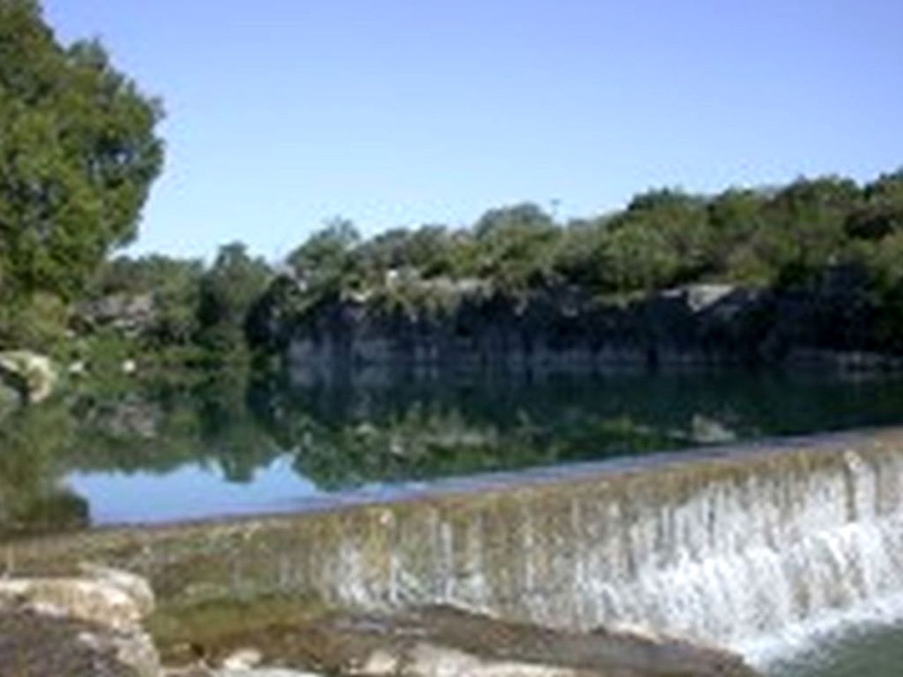 Lovely Cottage Rental with Waterfall on San Gabriel River near Austin, Texas
