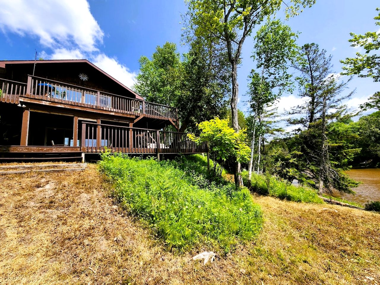 Riverfront Cabin Incredible for Outdoor Enthusiasts with Kayaks in Hessel, Michigan