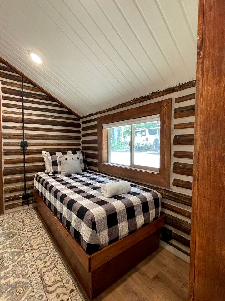 Charming Riverfront Cabin with Hot Tub and Dock Access Near Scenic Trails in Island Park, Idaho
