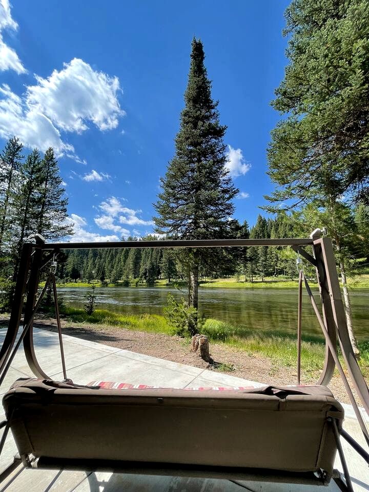 Charming Riverfront Cabin with Hot Tub and Dock Access Near Scenic Trails in Island Park, Idaho