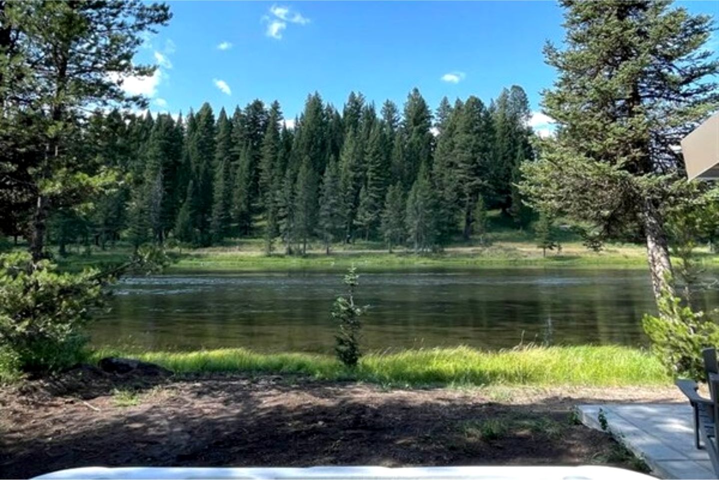 Charming Riverfront Cabin with Hot Tub and Dock Access Near Scenic Trails in Island Park, Idaho