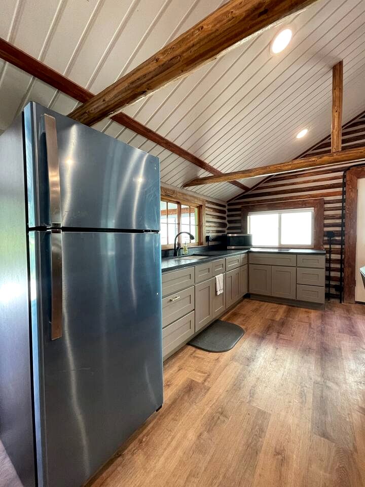 Charming Riverfront Cabin with Hot Tub and Dock Access Near Scenic Trails in Island Park, Idaho