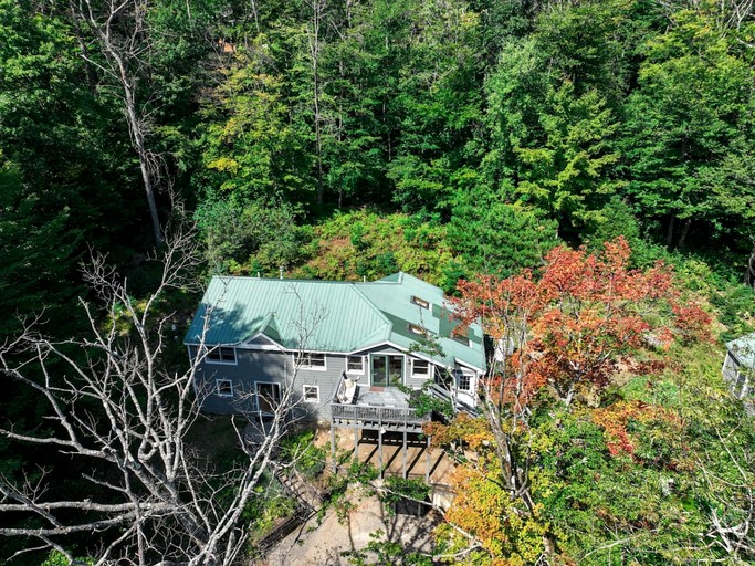 Riverfront Cabin with Cozy Interior and Deck Great for Groups in NH
