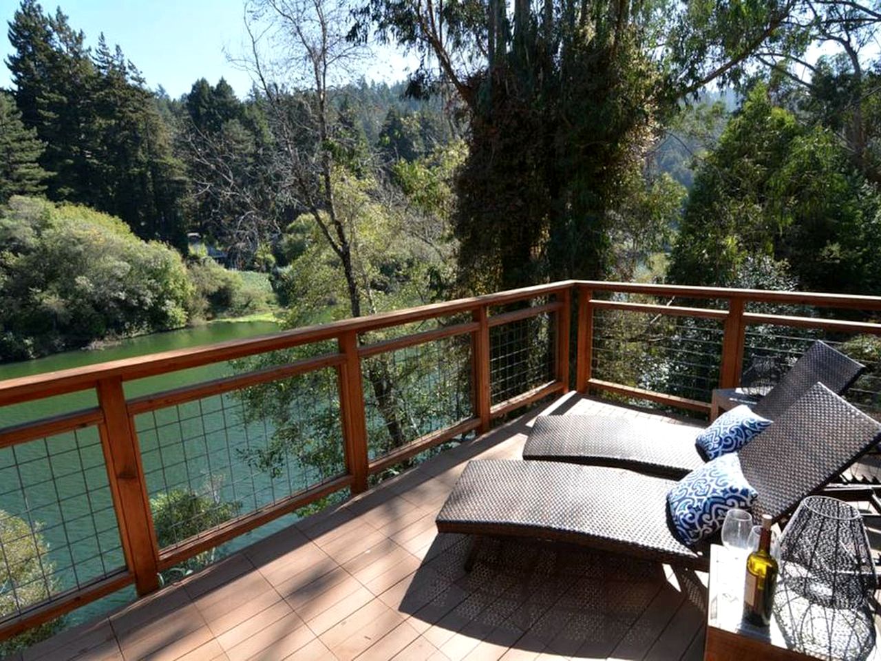 Riverfront Vacation Rental that Sleeps 10 with Dock and Hot Tub in Monte Rio, California