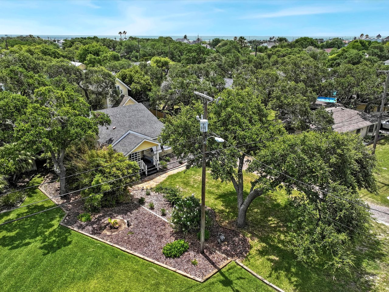 Charming Historic Beach House with Oak-Shaded Yard near Shore & Dining in Rockport, Texas
