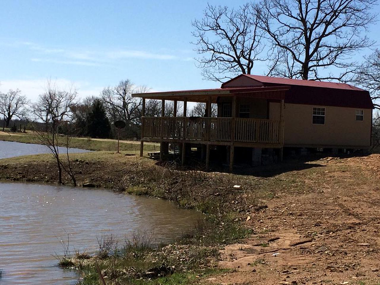 Rustic Cabin Rental with a Fishing Pond in Allen, Oklahoma