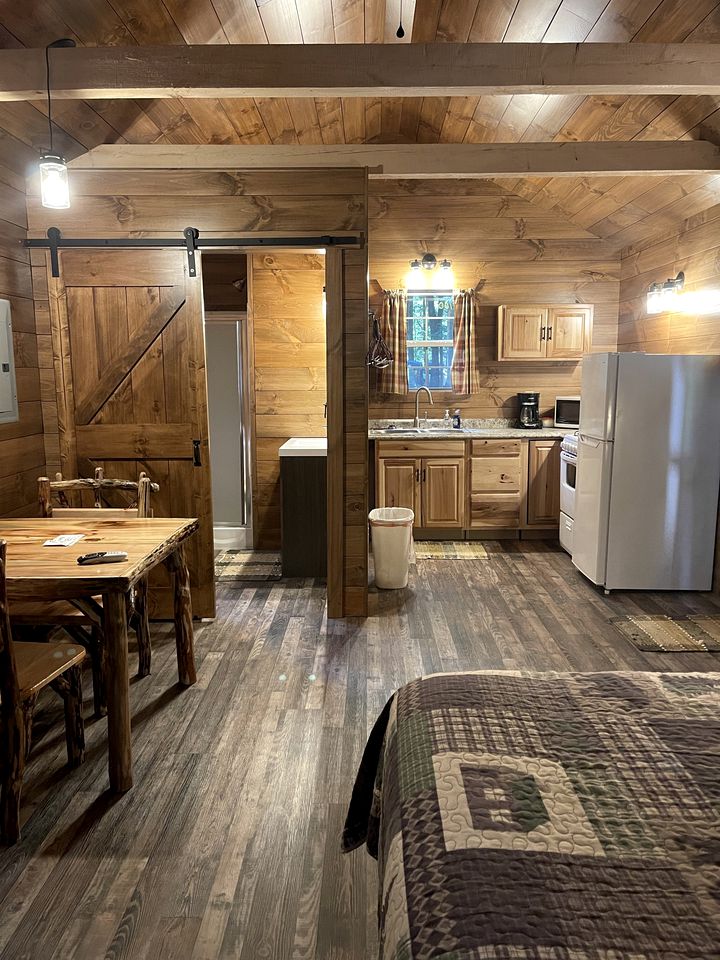 Romantic Cabin Escapes to this Charming Cook Forest Rental with Private Hot Tub