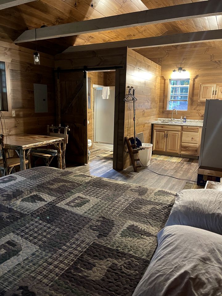 Romantic Cabin Escapes to this Charming Cook Forest Rental with Private Hot Tub