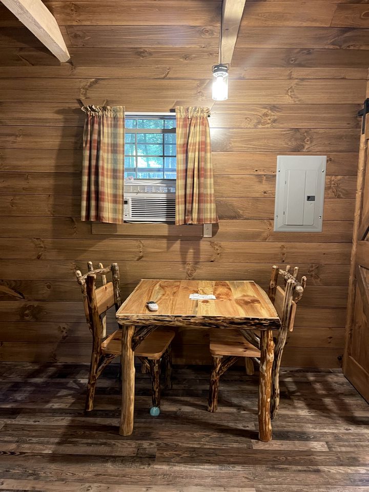 Romantic Cabin Escapes to this Charming Cook Forest Rental with Private Hot Tub