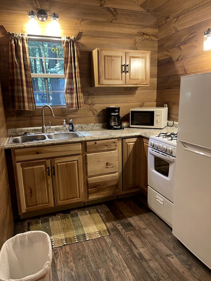 Romantic Cabin Escapes to this Charming Cook Forest Rental with Private Hot Tub
