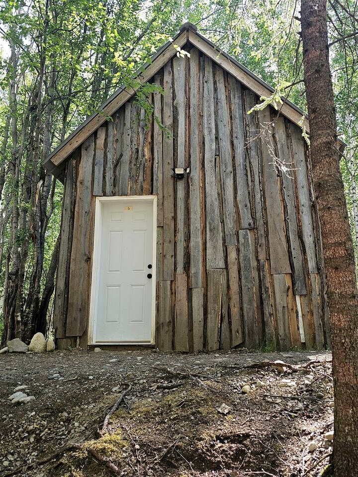 Peaceful Camp Cabin Retreat with Kids Play Zone, Firepits & Picnic Tables in Houston, Alaska