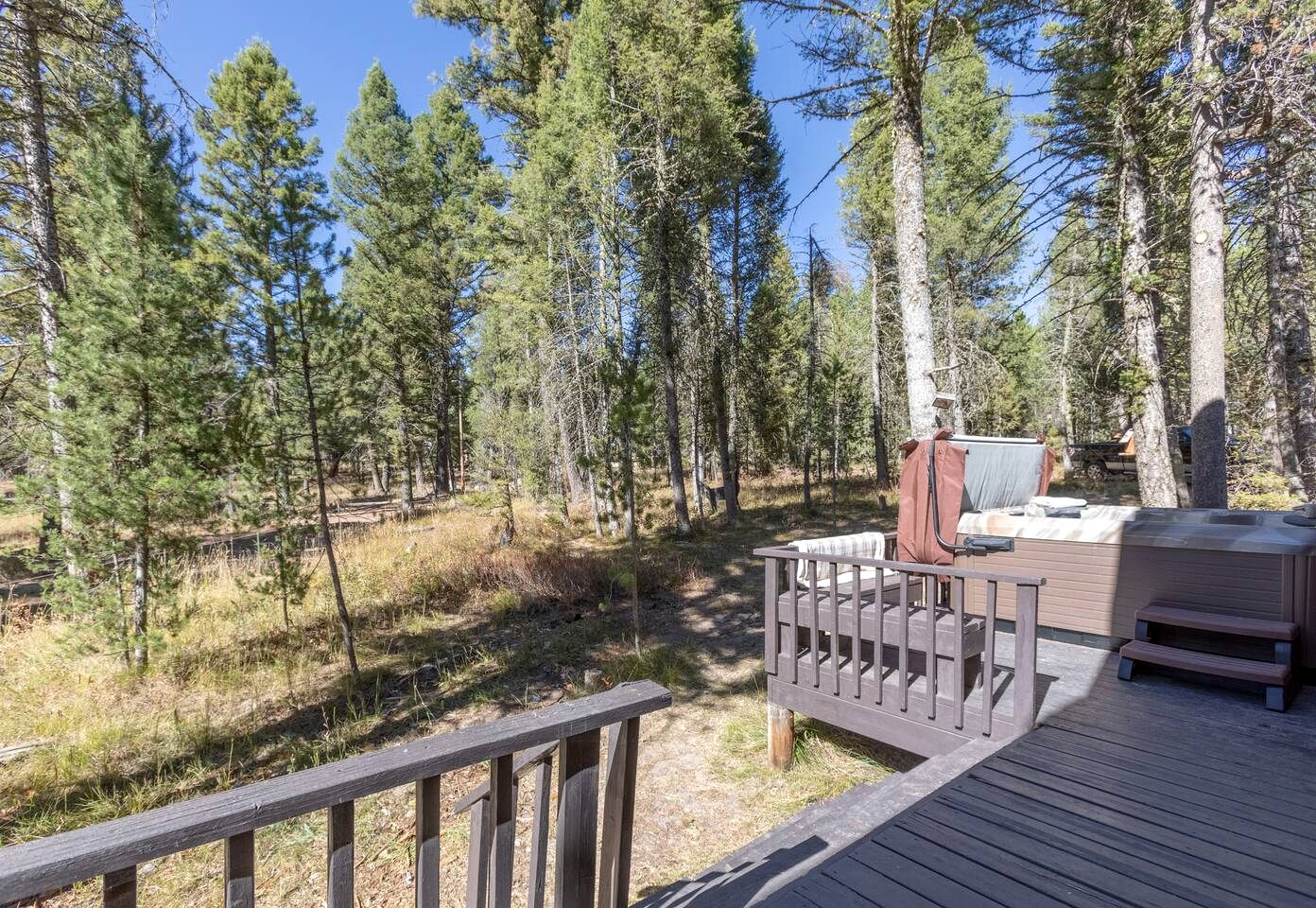 Spacious Rustic Cabin with Hot Tub and Game Loft Near Trails in Island Park, Idaho