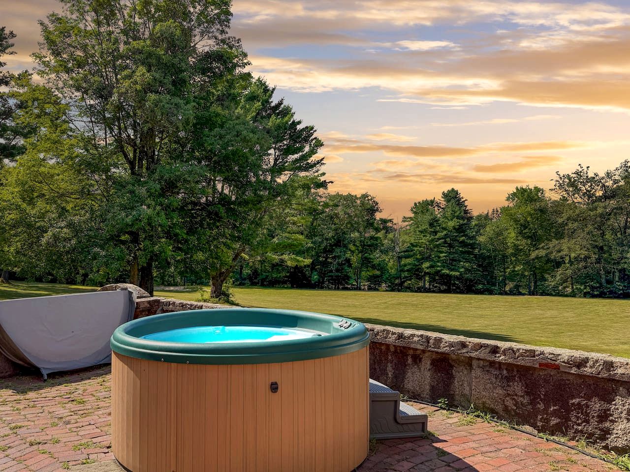 Secluded Group Retreat with Hot Tub, Riverfront & Huge Yard in Conway, New Hampshire