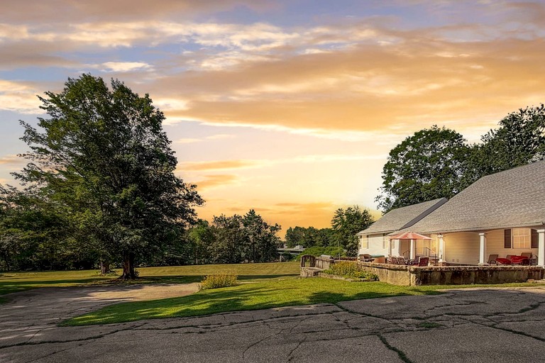 Secluded Group Retreat with Hot Tub, Riverfront & Huge Yard in Conway, New Hampshire