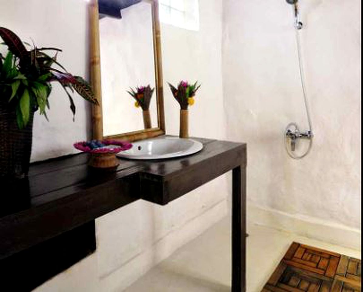 Safari Tents Nested by the Lao Jungle and Rice Fields