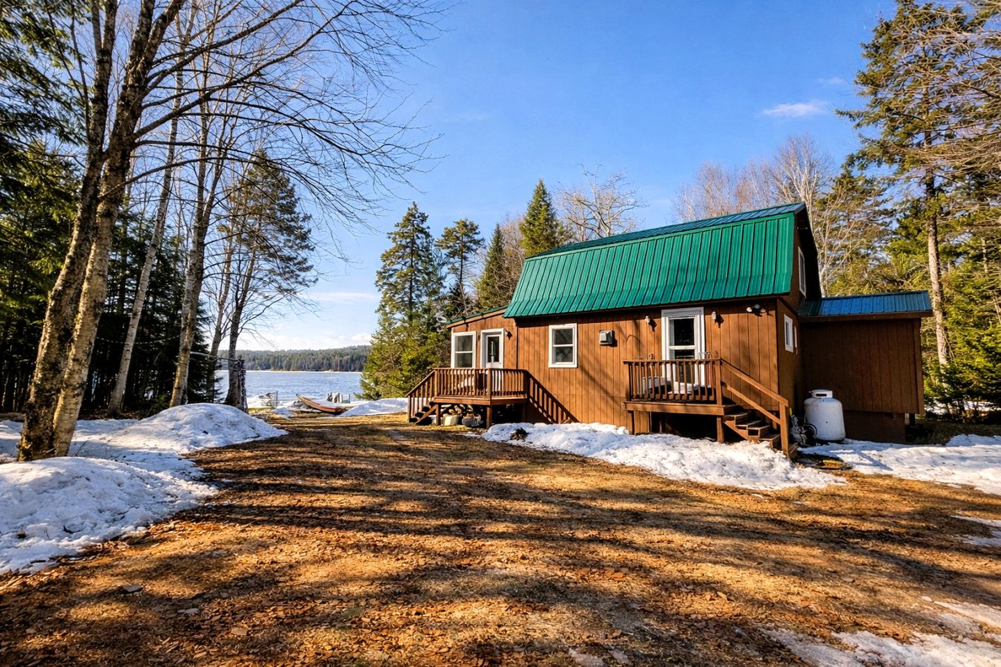 Quiet Waterfront Cabin with Fireplace, Porch & Nature All Around in Greenville, Maine