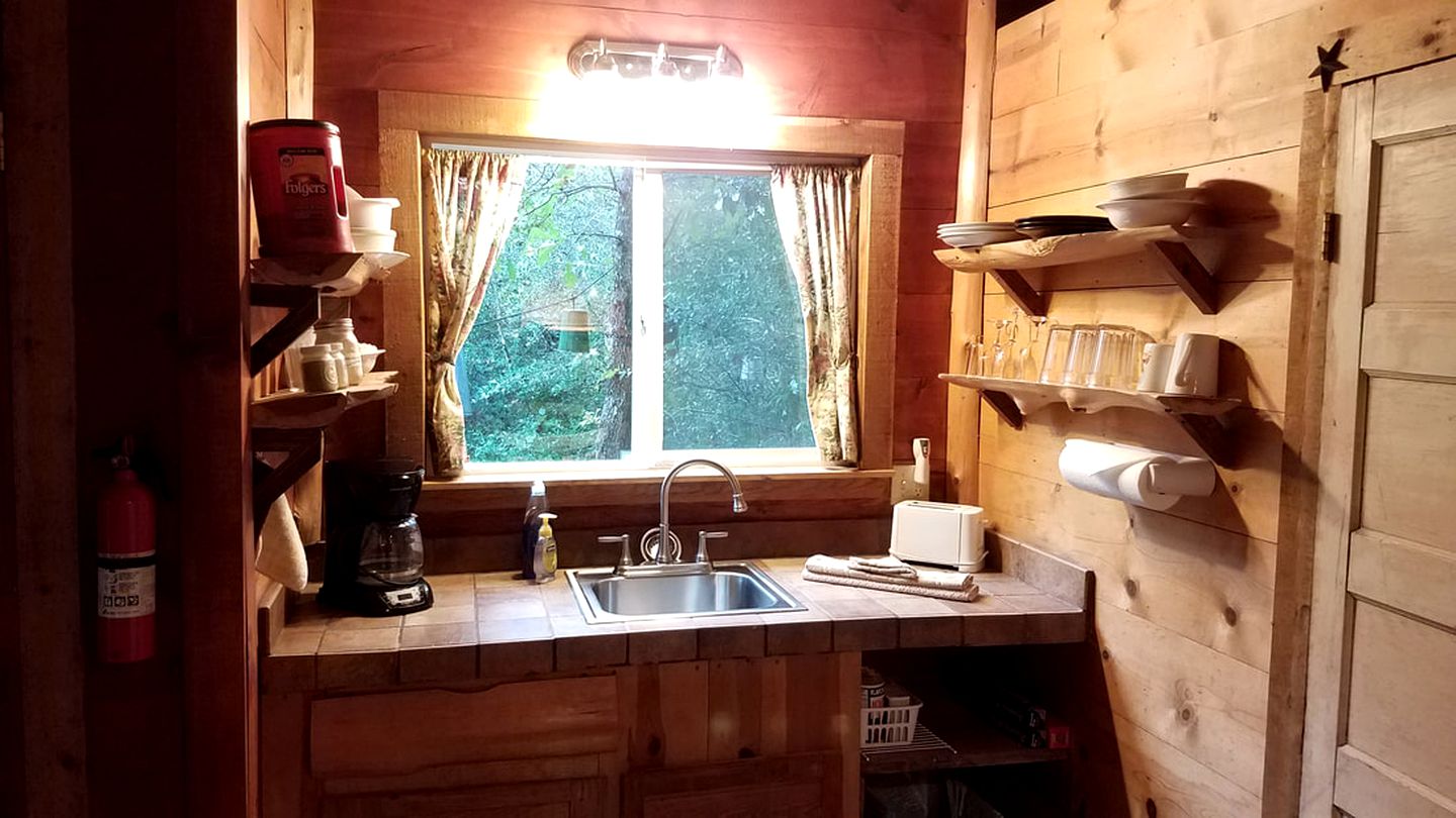 Romantic Cabin Rental with Sweet Front Porch near Brenham, Texas