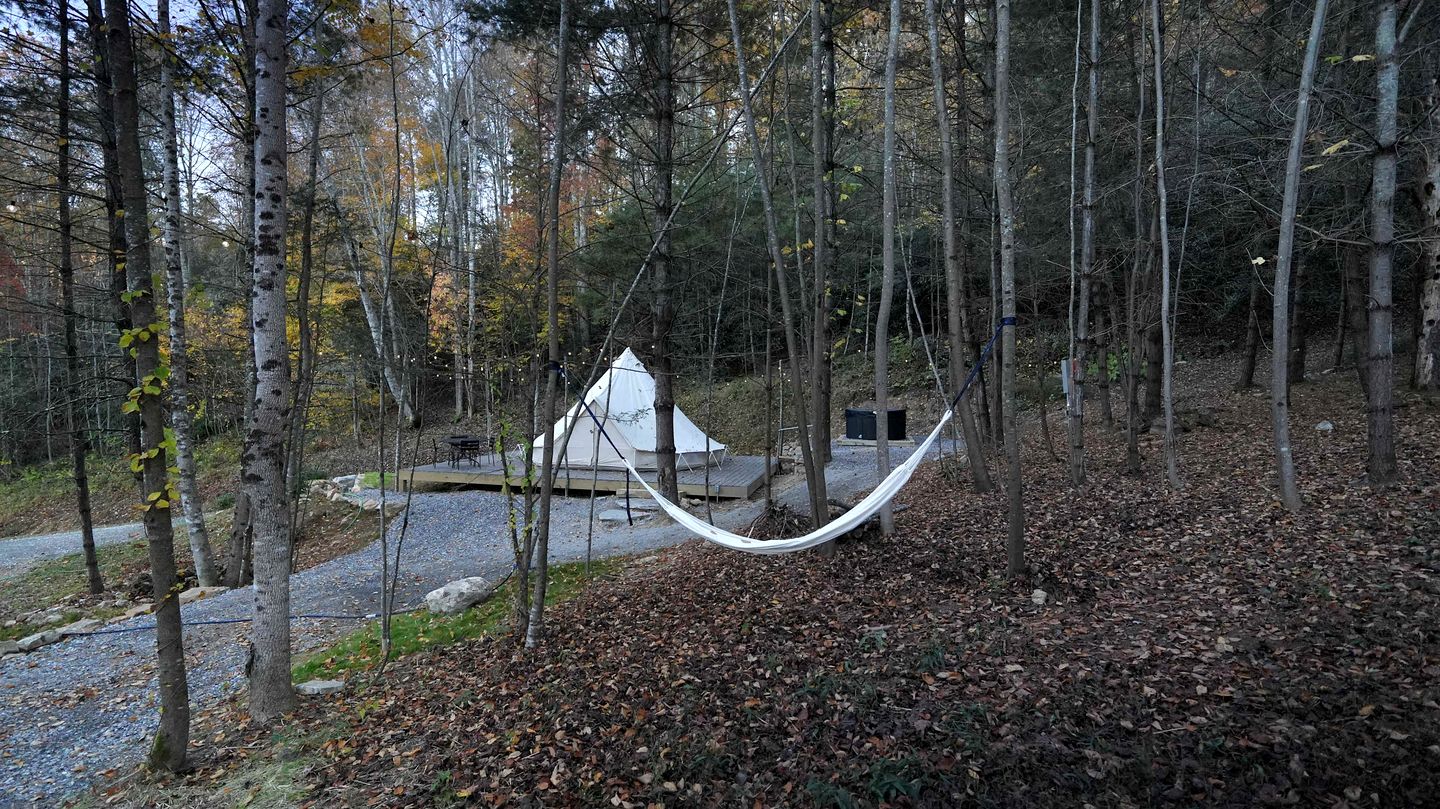 Secluded Rustic Chic Glamping Escape with Canvas Bell Tent and Tree Canopy in Waynesville, North Carolina