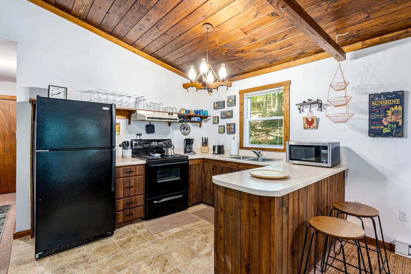 River Cabin with Hot Tub, Fire Pit, Screened Porch and Plenty of Outdoor Activities to Keep Your Group Busy in Great Cacapon, WV