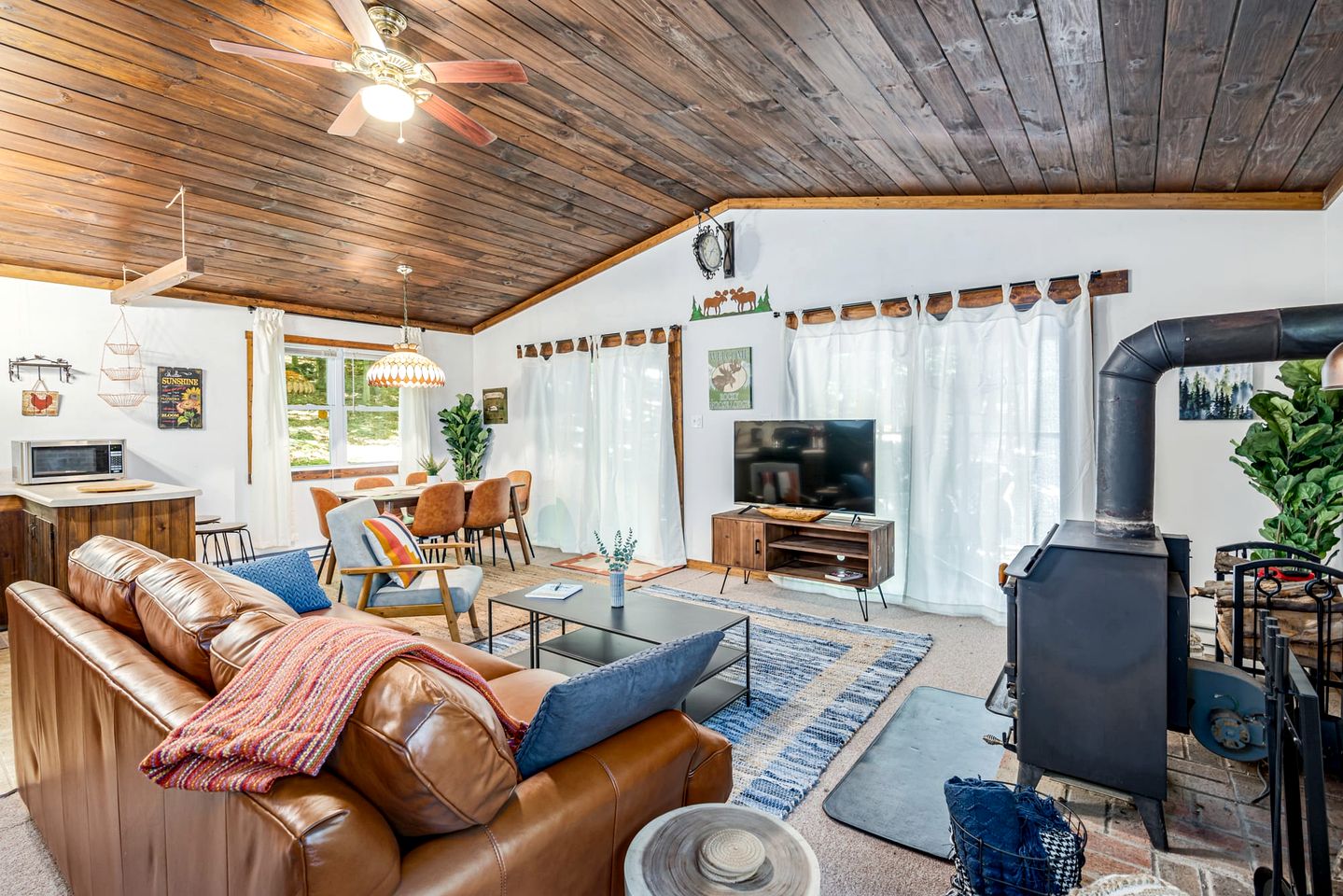 River Cabin with Hot Tub, Fire Pit, Screened Porch and Plenty of Outdoor Activities to Keep Your Group Busy in Great Cacapon, WV